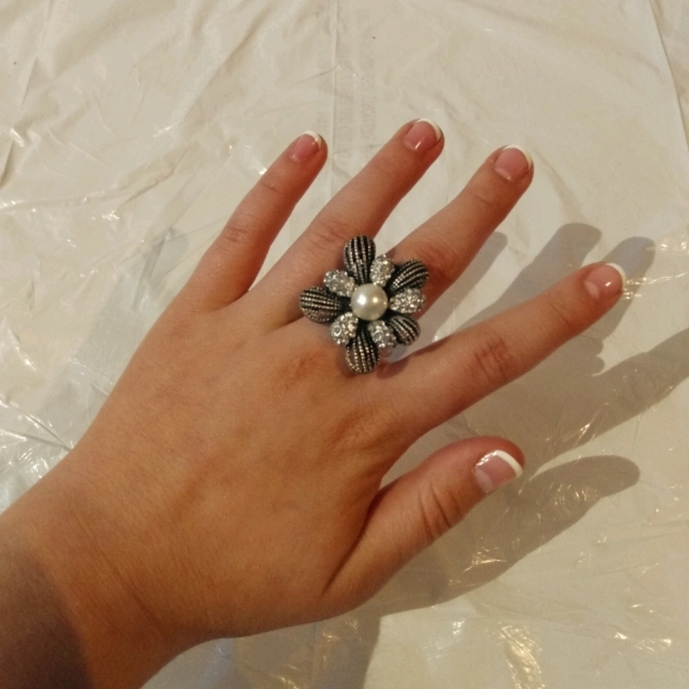 Silver, diamond, and pearl flower ring